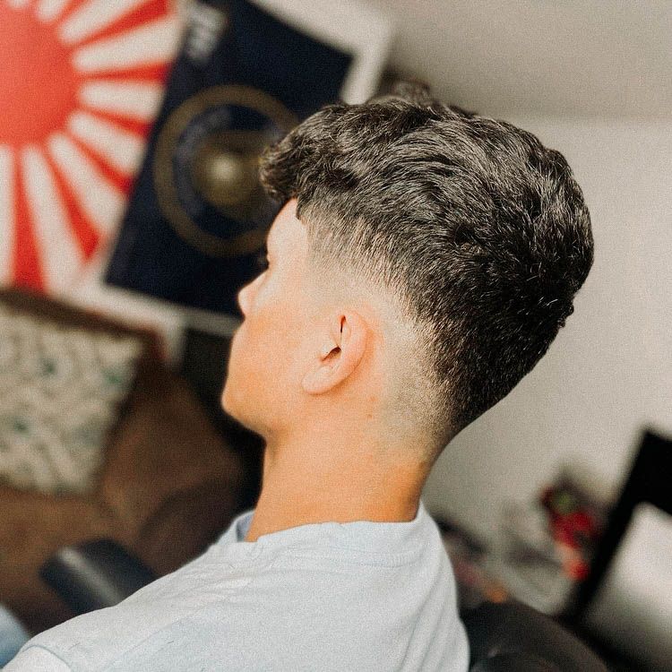 low burst fade mullet curly hair