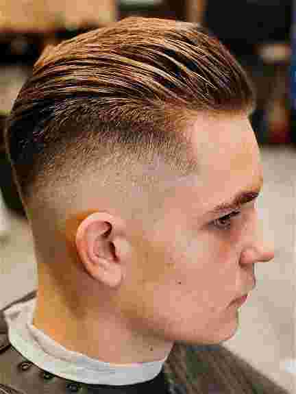 Mid Fade with Slicked Back Hair