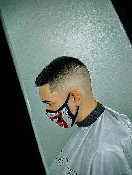 High Fade with Artistic Design