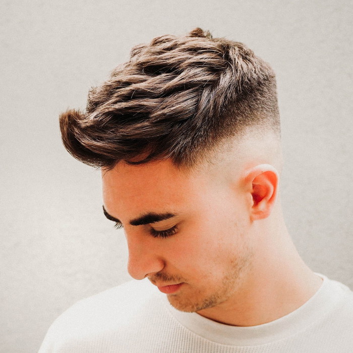 Image of Faux hawk long haircut oval face male