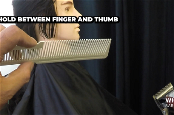 Clipper Over Comb Holding the Comb