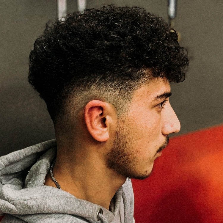 Low Skin Fade Curly Haircut With Disconnected Undercut - VIDEO – Regal  Gentleman