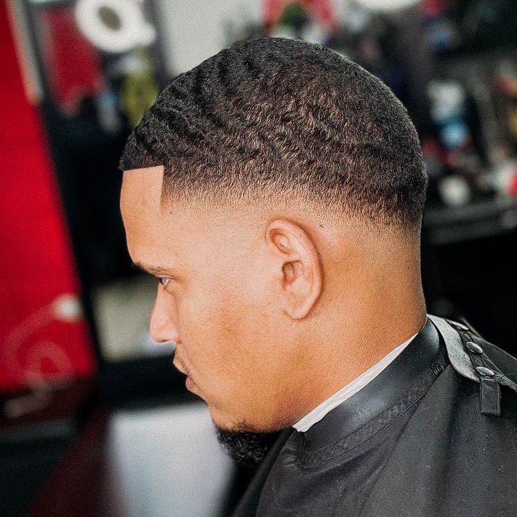 fade haircut with waves