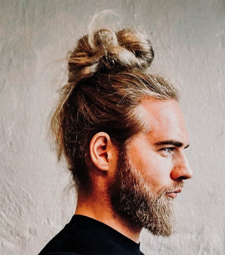 Top knot hairstyle male hi-res stock photography and images - Alamy